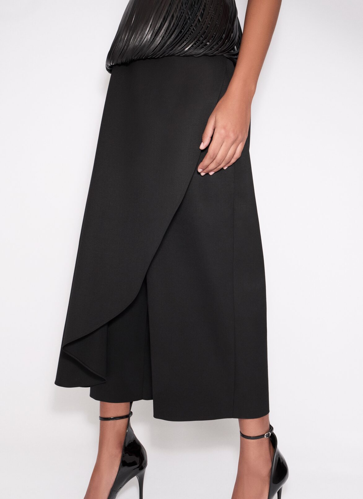 ASYMMETRICAL SKIRT TROUSERS ALAÏA BLACK ASYMMETRICAL SKIRT TROUSERS